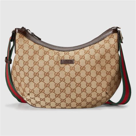 gucci gg canvas messenger bag.